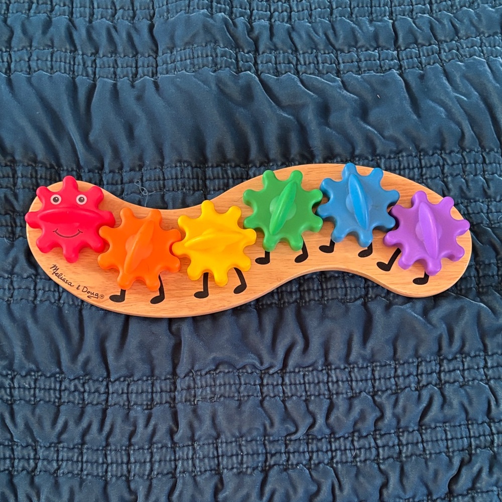 Melissa & Doug Vibrant Rainbow Caterpillar Gear Toy